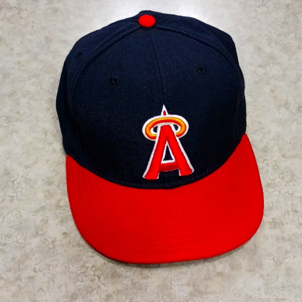 Los Angeles Angels New Era 5950 black and red fitted baseball cap.